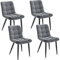 Ensemble de quatre chaises nordiques avec pieds metalliques reglables, dossier ergonomique et revetement gris fonce pour interieur moderne