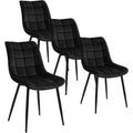 Ensemble de quatre chaises de salle a manger en velours noir, design moderne et confortable pour espace repas